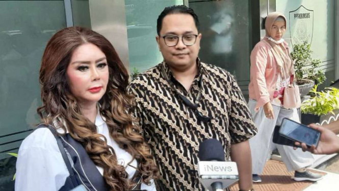 Titi Sumawijaya, wanita yang melaporkan pendiri Kaskus, Andrew Darwis.