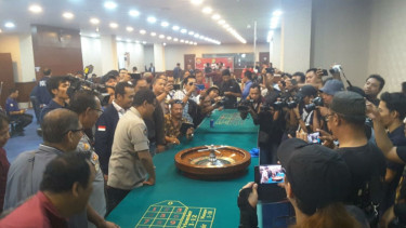 Apartemen Robinson saat penggerebekan judi
