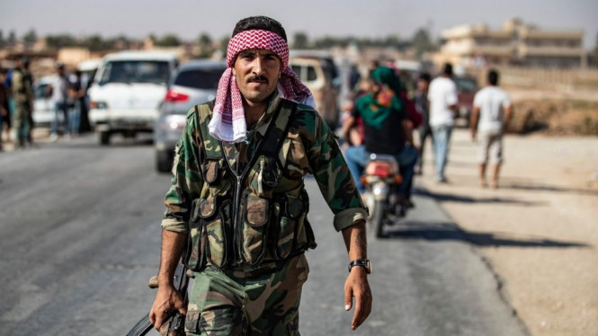 The Syrian regime is moving towards the Turkish border after Damascus reached a deal with Kurdish forces - AFP