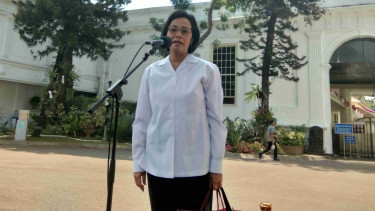 Sri Mulyani memberikan keterangan kepada wartawan di Istana usai ketemu Jokowi.