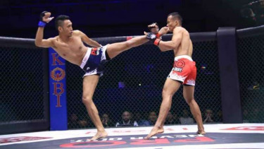 Duel One Pride MMA Pro Never Quit antara Marton Tampubolon vs Dedi Kurniawan