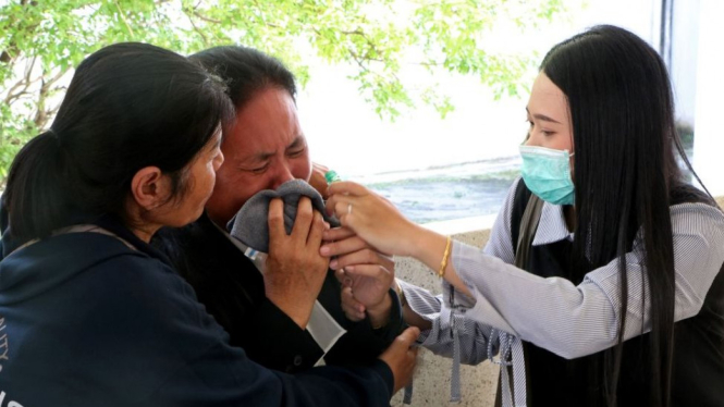 A relative of a volunteer who was killed in the attack - Getty Images