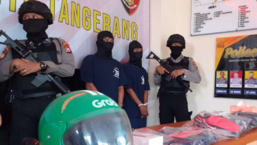 Polisi tangkap pengemudi Grab karena melakukan pencurian di Alfamart.