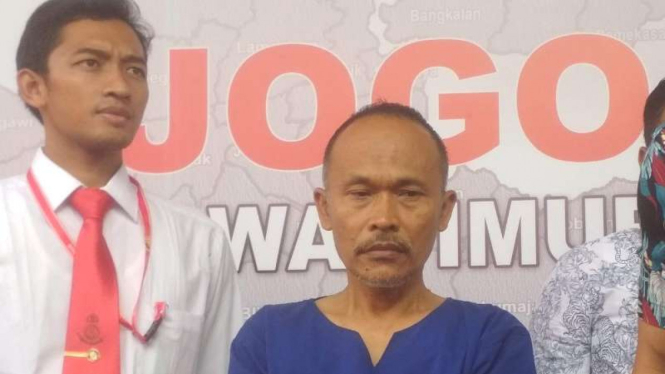 MNM (50), pelaku pencabulan terhadap enam anak di bawah umur.