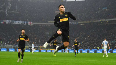 Penyerang Inter Milan, Lautaro Martinez, melakukan selebrasi usai mencetak gol