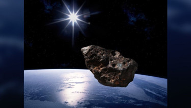 Asteroid mendekati Bumi.