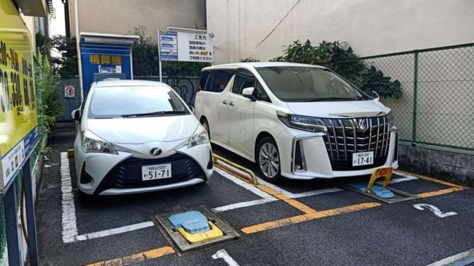 Ilustrasi garasi mobil berbayar di tengah pemukiman warga di Jepang