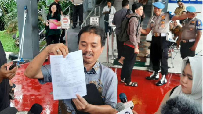 Roy Suryo usai membuat laporan (foto ilustrasi)