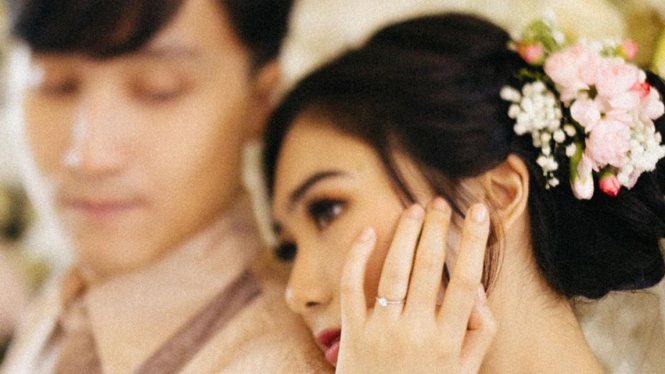 Isyana Sarasvati dan Rayhan Maditra.