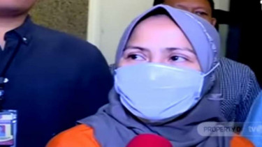 Zikria Dzatil, perempuan yang ditetapkan sebagai tersangka penghina Wali Kota Surabaya Tri Rismaharini alias Risma.