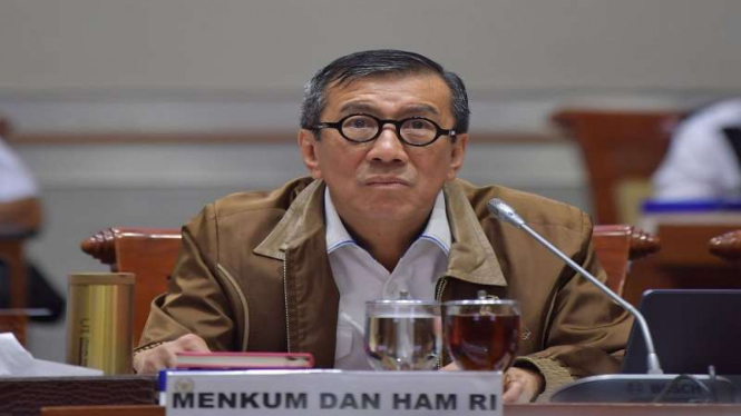 Menteri Hukum dan HAM Yasonna Laoly saat mengikuti rapat kerja dengan Komisi III DPR.