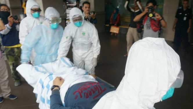 Ilustrasi simulasi penanganan virus Corona .
