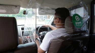 Sekat pelindung di layanan GoCar.