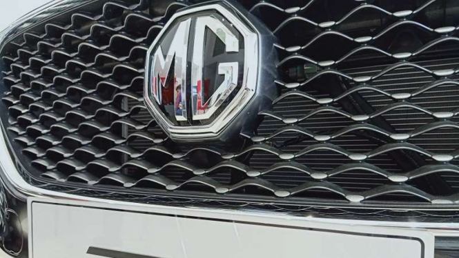 Ilustrasi logo mobil MG