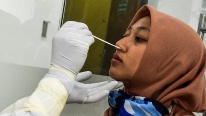 Ilustrasi tes swab.-ANTARA FOTO/FB ANGGORO/WSJ