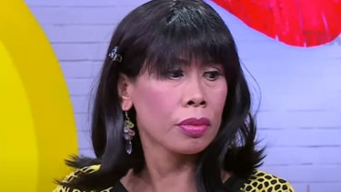 Pelawak Omas Wati.