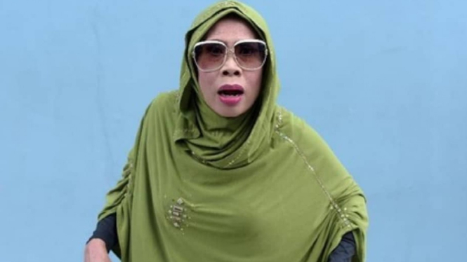 Almarhumah Omas Wati.