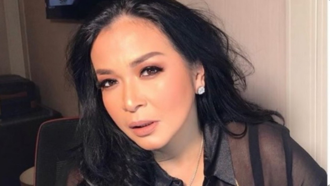 Jennifer Jill Armand atau Jennifer Jill Supit alias Jennifer Ipel