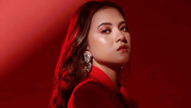 Marsha Aruan.