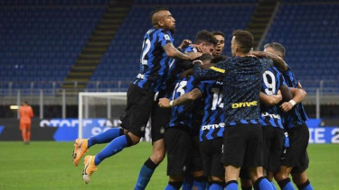 Selebrasi pemain Inter Milan usai cetak gol.