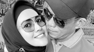 Meggy Wulandari dengan suami barunya.