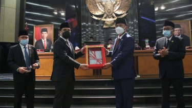 Perda DKI soal COVID-19 disahkan.