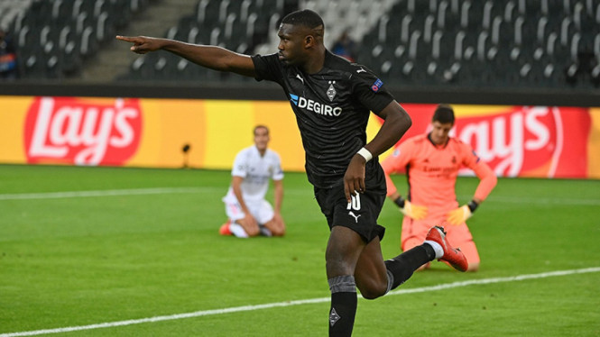 Selebrasi Marcus Thuram usai mencetak gol ke gawang Real Madrid.