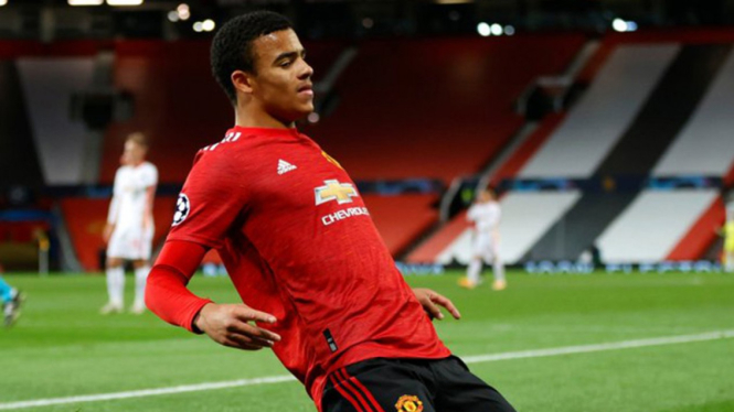 Pemain Manchester United, Mason Greenwood rayakan gol ke gawang RB Leipzig.