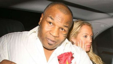 Mike Tyson dan mantan kekasihnya, Aisleyne Horgan-Wallace