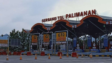 Gerbang tol Palimanan dalam kondisi lalu lintas normal.