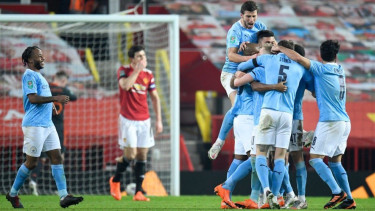 Pemain Manchester City rayakan kemenangan lawan Manchester United.