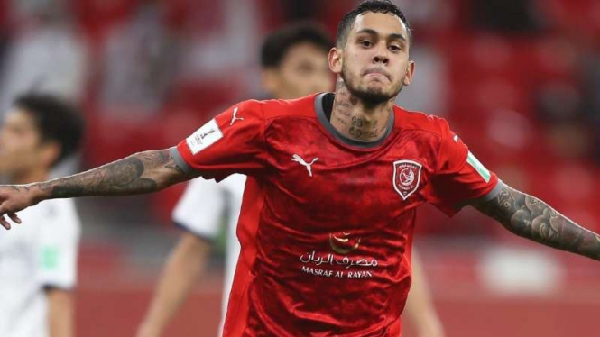 Pemain Al Duhail, Edmilson Junior rayakan gol.
