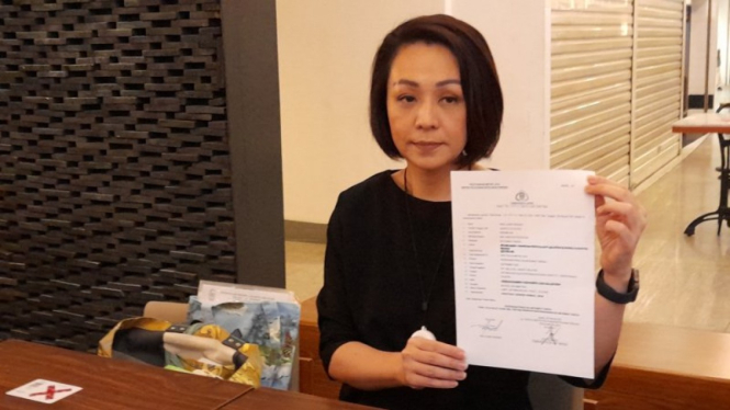 Rina Lauwy Kosasih, Istri Direktur Utama (Dirut) Taspen Antonius Steve Kosasih.