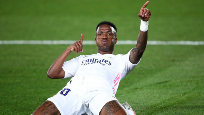 Selebrasi winger Real Madrid, Vinicius Junior usai bobol gawang Liverpool.