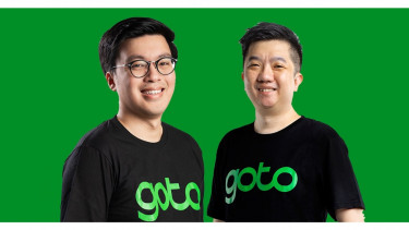 Dua petinggi GoTo, Kevin Aluwi (kiri) dan William Tanuwijaya.