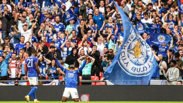 Kelechi Iheanacho merayakan gol