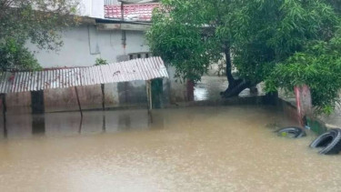 Banjir melanda Kabupaten Asahan, Sumatera Utara.