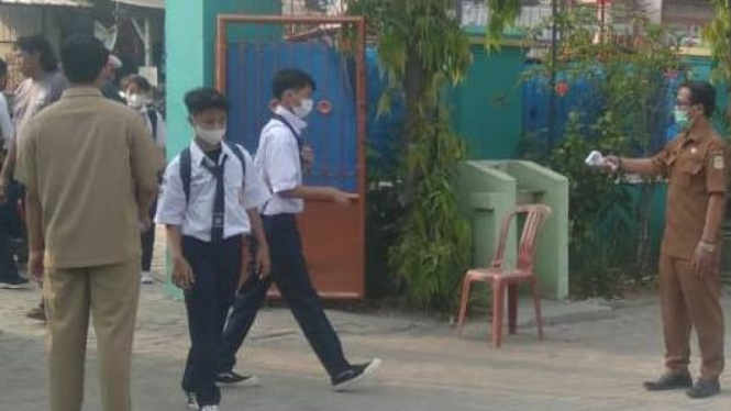 Ilustrasi siswa malaksakan pembelajaran tatap muka (PTM).