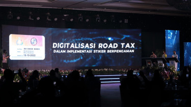 Program road tax berbasis stiker.