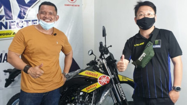 Aipda Ambarita dan motor trail kesayangan