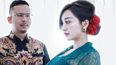 Cupi Cupita dan suami.