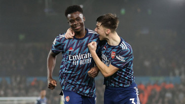 Selebrasi pemain Arsenal usai bobol gawang Leeds United