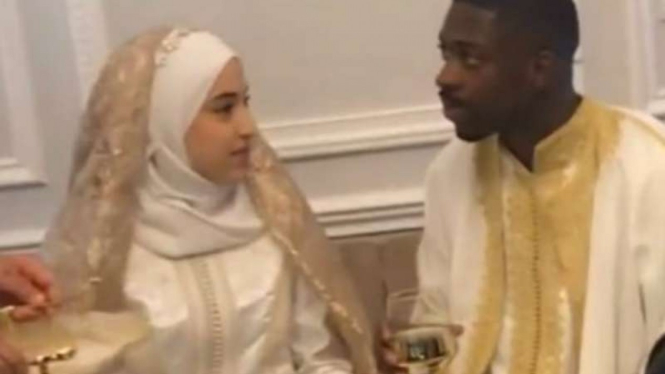 Ousmane Dembele dan istrinya Rima Edbouche