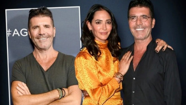 Simon Cowell dan kekasihnya Lauren Silverman.