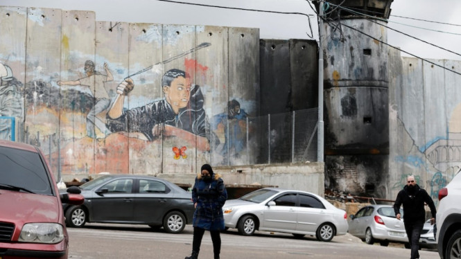 Amnesty International mengatakan Israel menerapkan kebijakan penindasan dan dominasi terhadap warga Palestina. (Reuters:Â Mussa Qawasma)