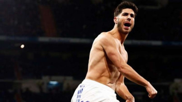 Marco Asensio rayakan gol Real Madrid.