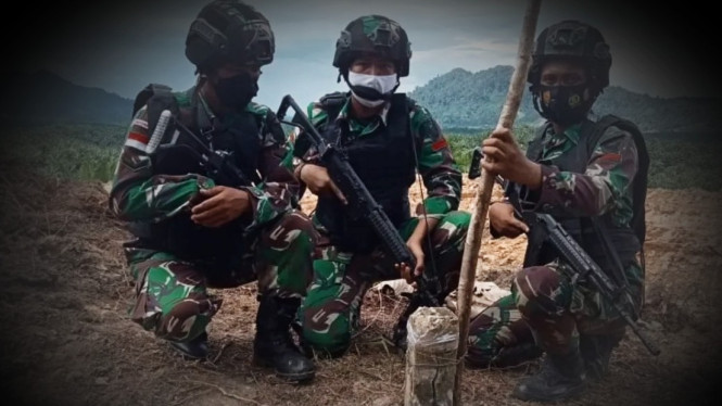 VIVA Militer: Prajurit Yonif 144/JY di perbatasan RI - Malaysia.