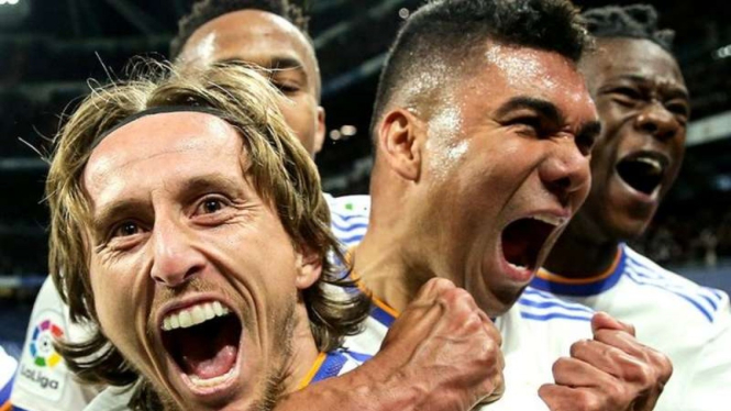 Pemain Real Madrid rayakan gol.