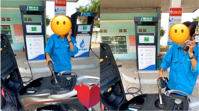 Petugas SPBU melayani konsumen sembari menelepon