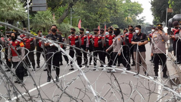 Polisi mengamankan aksi 